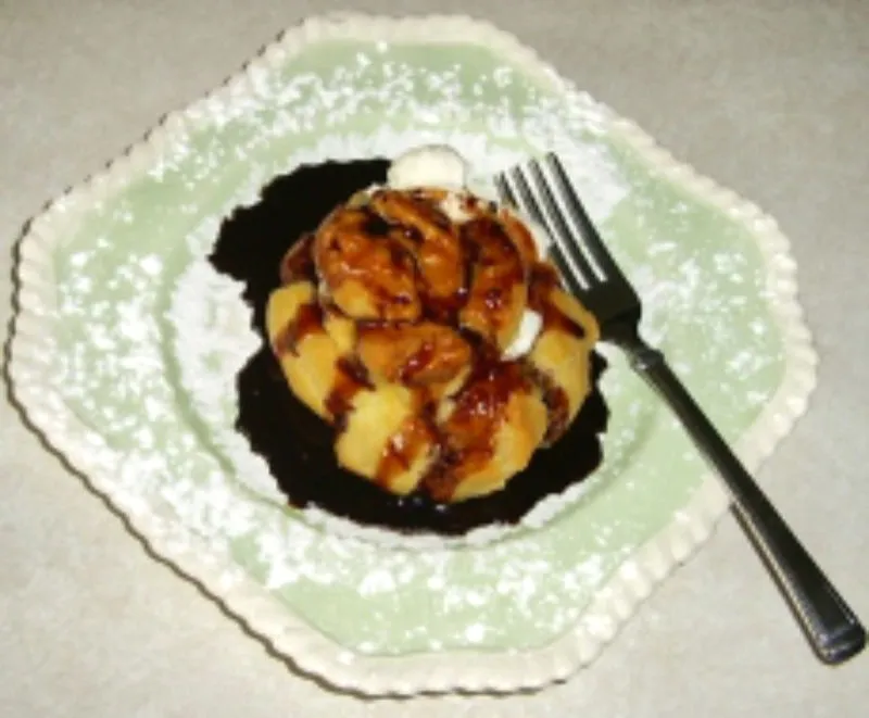 Chocolate sauce on a cream puff