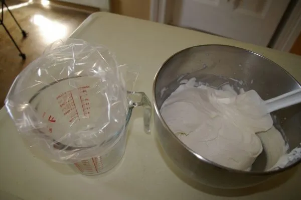 Prepare the filling and put a large freezer bag in a measuring cup